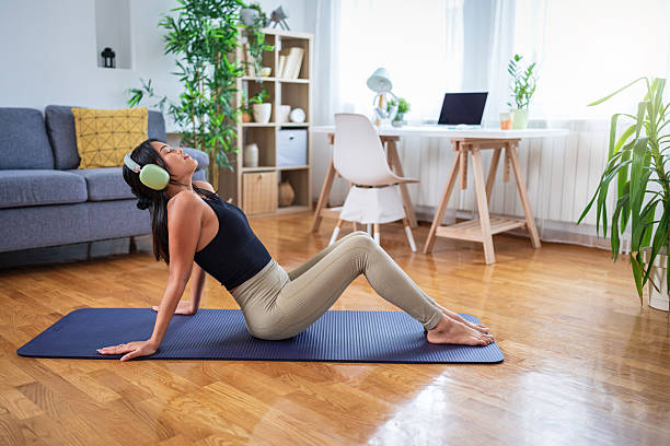 Person doing active breathing exercises in a bright room