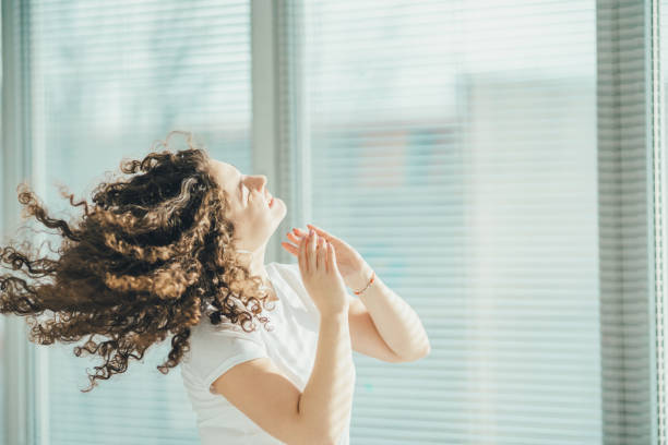 Morning breathwork session by a window with natural light