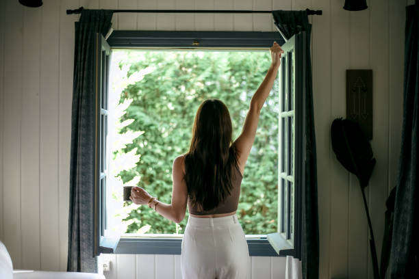 Energising morning breathwork by an open window